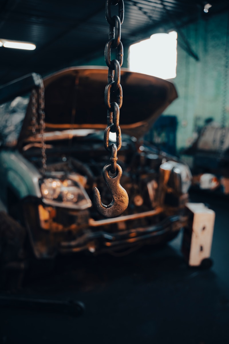 a machine with a large wheel, garage, car auto repair service