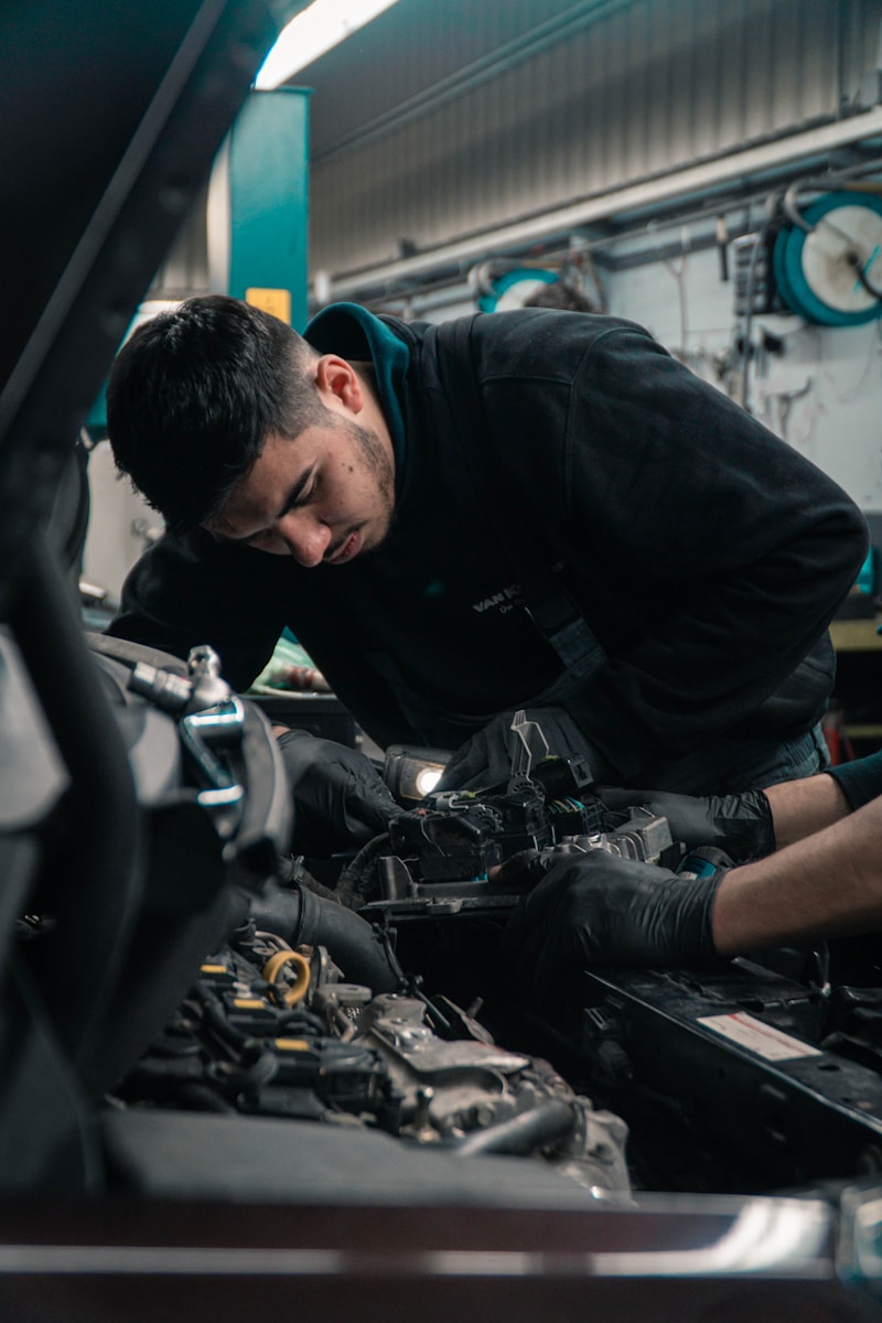 man in black jacket, car auto repair service